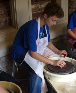 Harrison throwing pottery